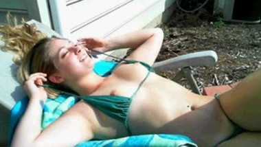 Teen Veronica tanning getting hot and topless in her garden