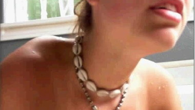 Adorable teen filming in her bathtub