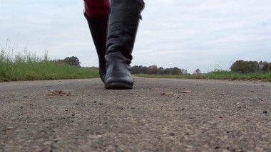 girl walk in flat boots