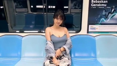 Malay Girl doing a short video in the train