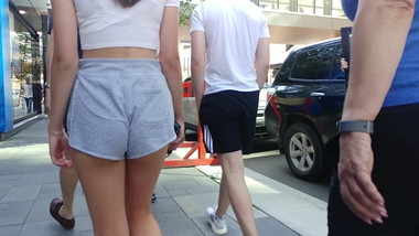 Long walk with perfect ass in shorts