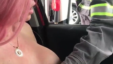 Naughty girl flashing in gas station