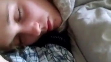 Boyfriend wakes his girlfriend with facial