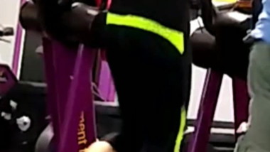 Tiny skinny petite Japanese girl working out at the gym