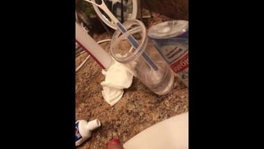 XXXtra small teen pisses in sink?!?