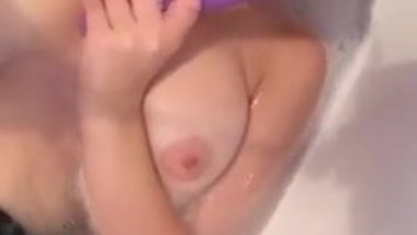 Big tits teen fingering herself in bathtub