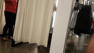 girl in dressing room knows she is being watched