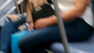 Blonde Latin skinny girl on the train in sandles